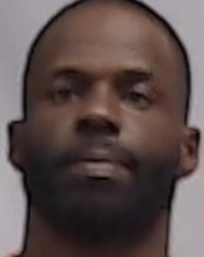 WVU assistant coach and former football star Noel Devine booked on felony strangulation charge
