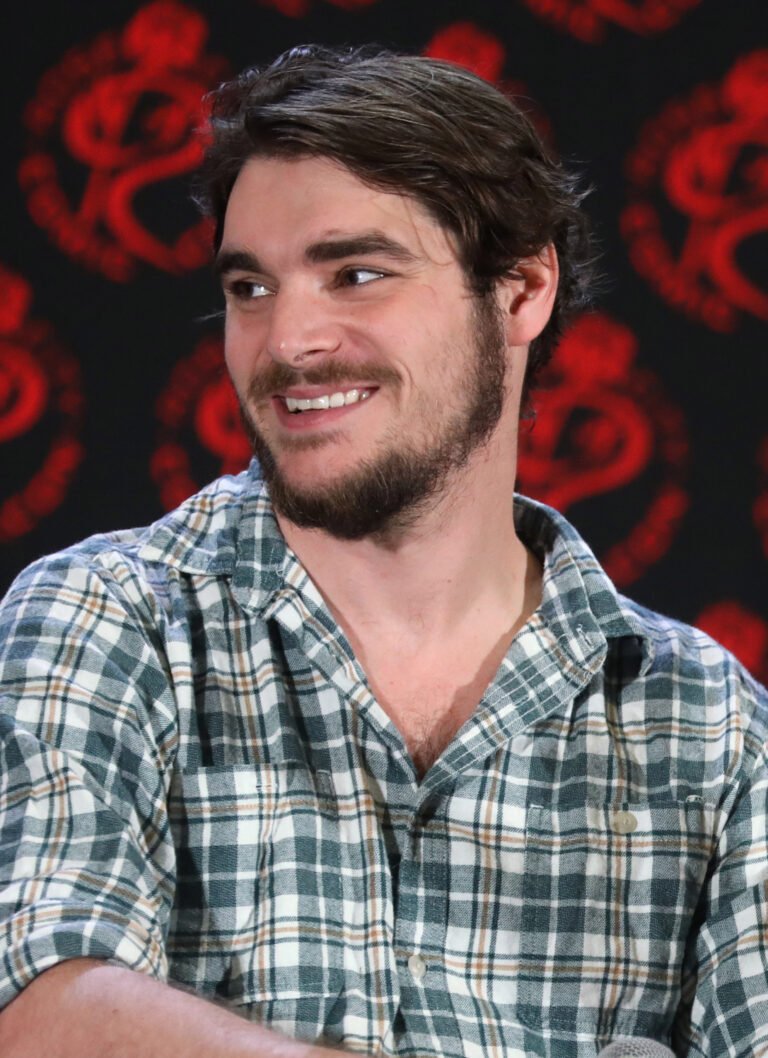 RJ Mitte speaking at Rose City Comic Con in 2024. Photo by Gage Skidmore, CC BY-SA 3.0.