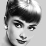 Charcoal-and-chalk drawing of Audrey Hepburn, shown in a close-up portrait.
